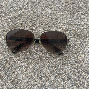 Dolce and Gabbana aviator sunglasses.